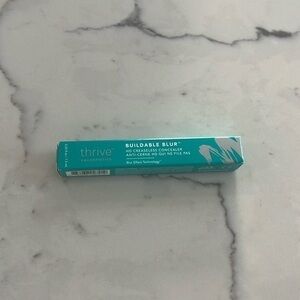 Thrive cosmetics buildable blur in shade very deep